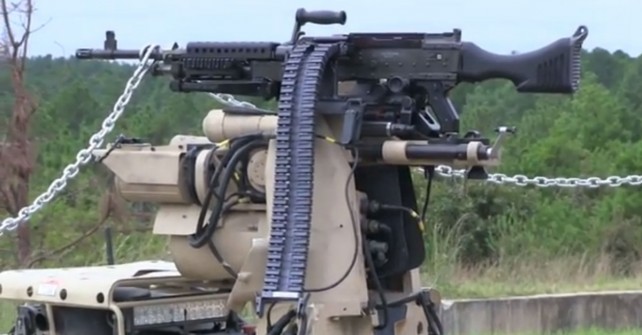 US Military Test Robot Firing A Machine Gun