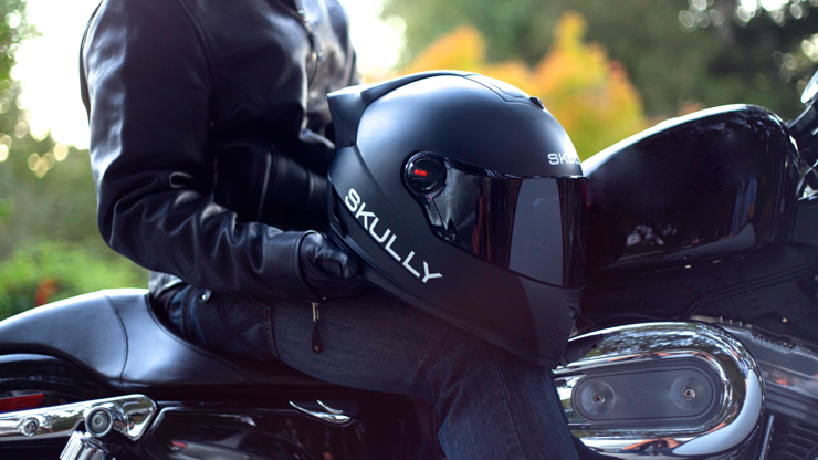 http://www.ohgizmo.com/2013/10/21/slick-motorcycle-helmet-with-an-hud-could-eliminate-blind-spots-provide-gps-guidance-and-make-your-friends-jealous/